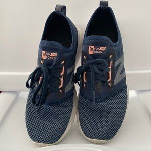 Navy and blue new balance, size 7.5